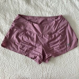 Purple Nike shorts